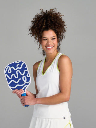 Model is wearing size small in The Jenni - White tank and The Sondra - White/Ace skort.