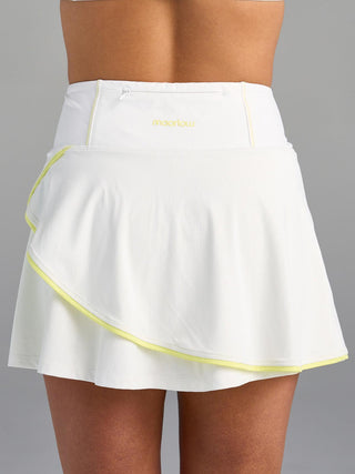 Model is wearing size small in The Sondra - White/Ace skort.