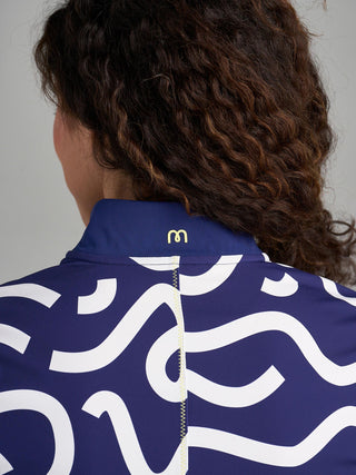 Model is wearing size small in The Brooksie - Rally Print pullover.