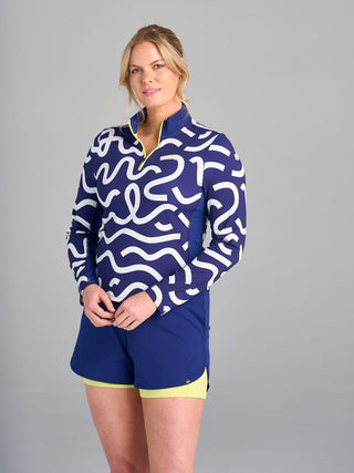 Model is wearing size large in The Brooksie - Rally Print pullover and The Rock - Midnight shorts.