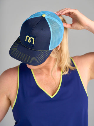 Model is wearing the one size Trucker Hat and size large in The Jenni - Midnight tank.