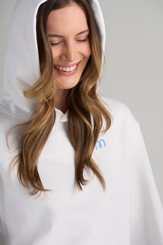 Model is wearing size small in the Hoodie White.