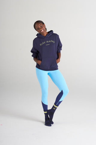 Model is wearing size small in the Hoodie Midnight and the Traveler Baseline legging.