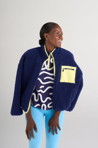 Model is wearing size small/medium in the Betsy Midnight fleece.